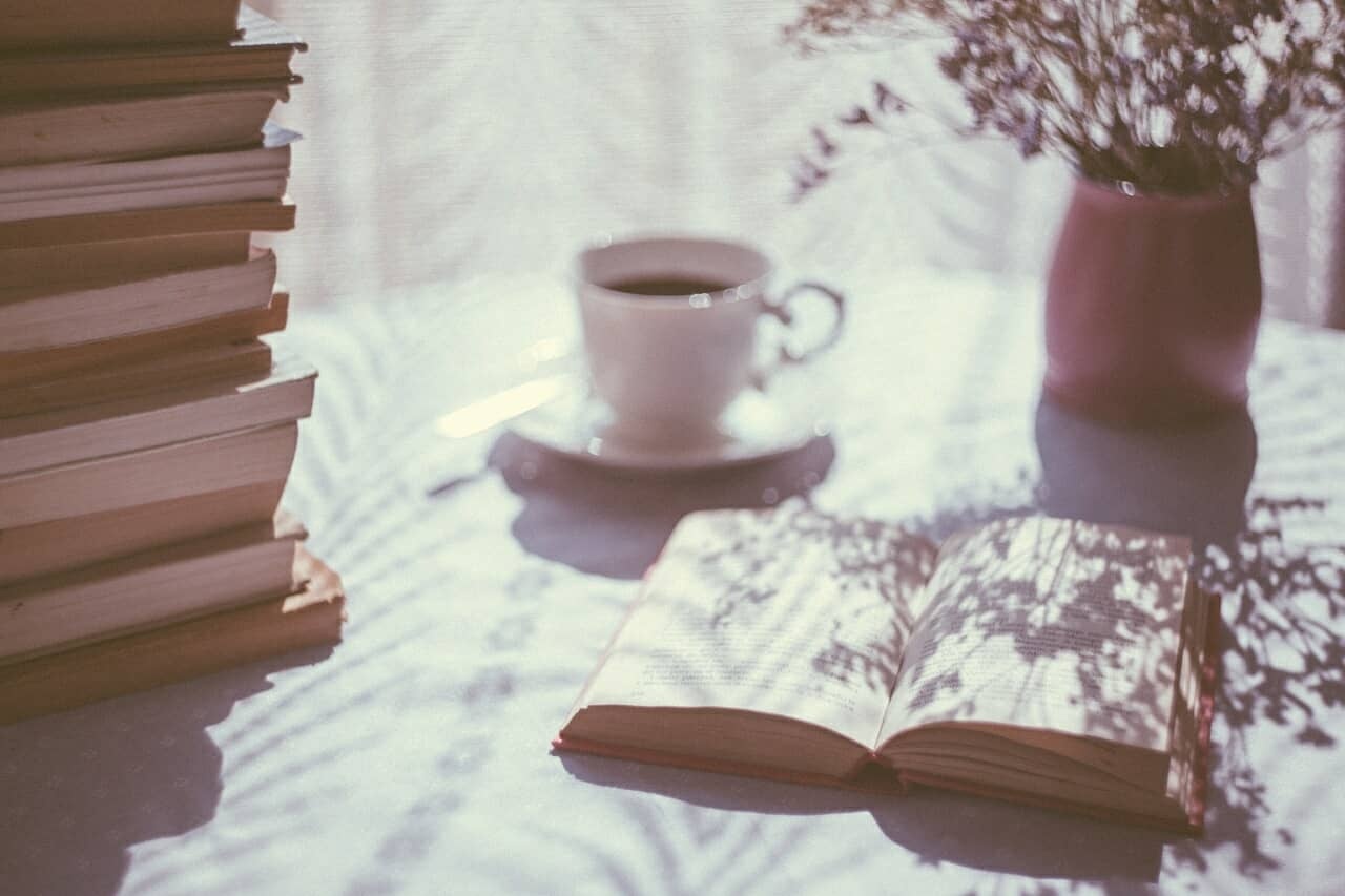 relaxing study scene with coffee flowers and books