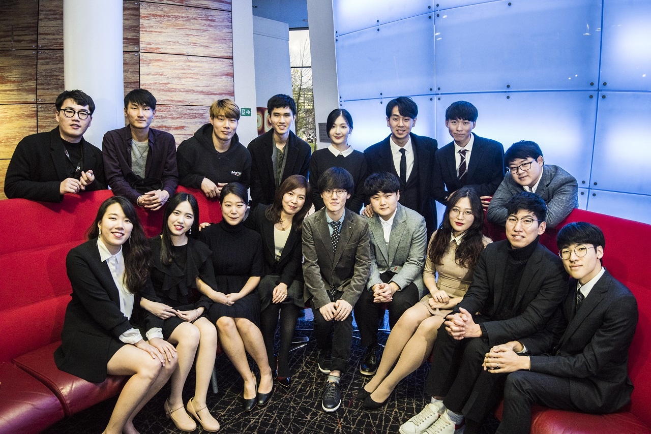 Students from the IEN Institute alongside Academic Director Joan Park