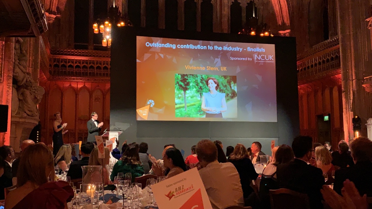 Stuart Smith announcing Vivienne Stern as the winner of the 'Outstanding contribution to the industry' award.