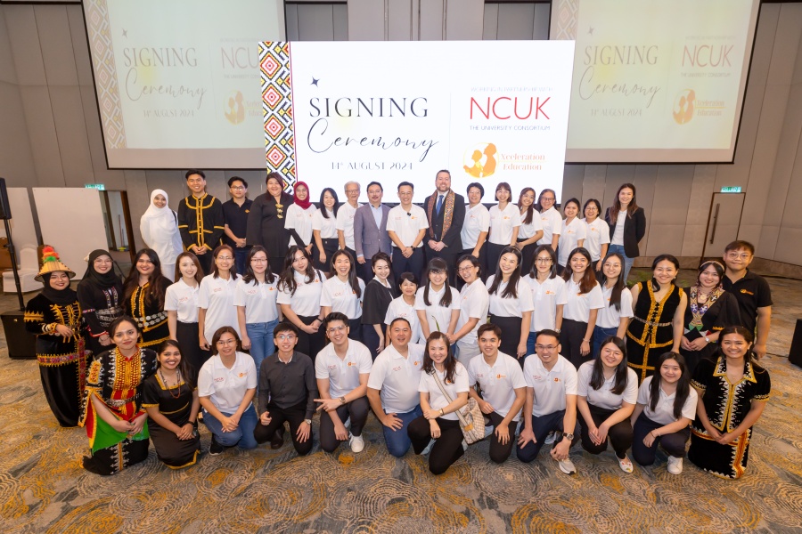 Group picture of speakers and guests.